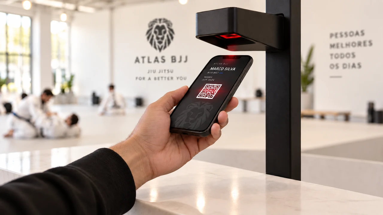 A scanner at the front desk reading the QR code on a member's phone